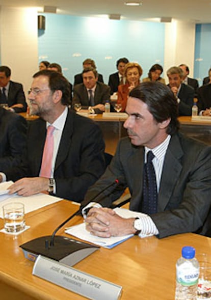 Aznar y Rajoy, ayer en la Junta Nacional del PP.