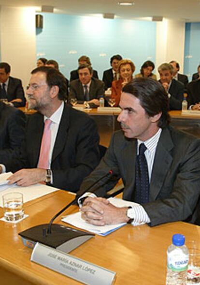 Aznar y Rajoy, ayer en la Junta Nacional del PP.