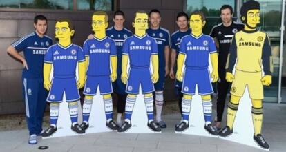 Fernando Torres (second left) with his fellow Chelsea players and their 'Simpsons' caricatures.