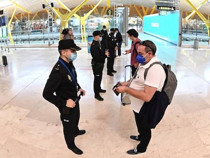Police checkpoint at the Barajas airport in Madrid, which has been under a state of alarm since Friday.