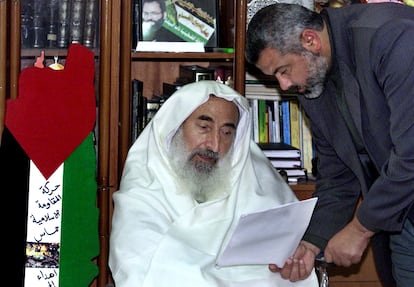 Hamas founder Ahmed Yasin with Ismail Haniya at his home in Gaza in 2002.