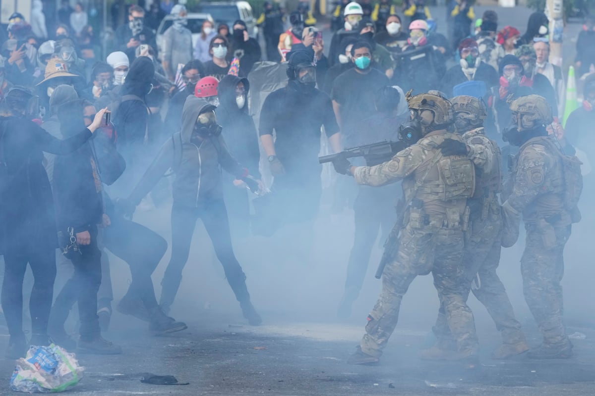 Federal judge restricts use of tear gas against protesters outside ICE building in Portland