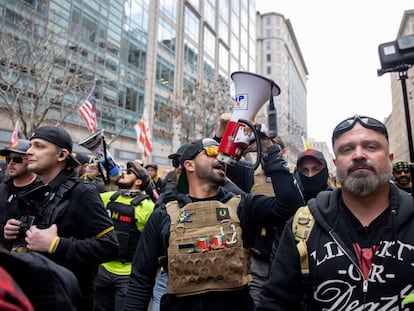 Enrique Tarrio, center, at a Proud Boys event on December 12, 2020 in Washington.