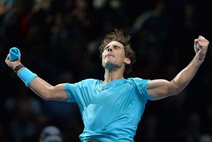 Spain&#039;s Rafael Nadal celebrates beating Switzerland&#039;s Stanislas Wawrinka during their group A singles match.