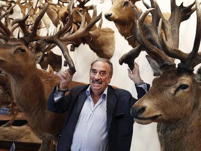 Marcial Gómez Sequeira posing with some of the trophies that were kept inside his Madrid home.