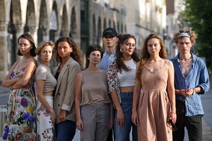 Eight members of the Fulcro theater company pose for a photo in Jaffa, in July 2023.