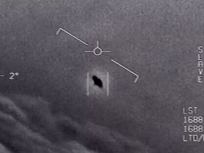 In an image from a 2015 Department of Defense video, an object is seen rising through the clouds, traveling against the wind.