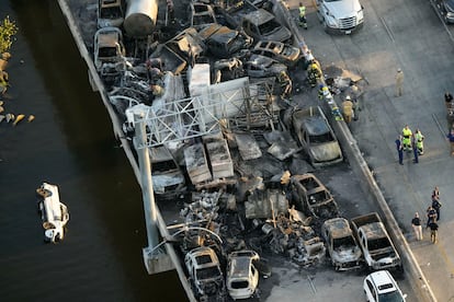 In this aerial photo, responders are seen near wreckage in the aftermath of a multi-vehicle pileup on I-55 in Manchac, La., Monday, Oct. 23, 2023