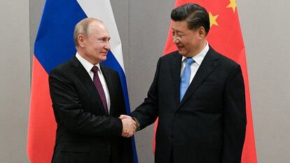 Vladímir Putin y Xi Jinping, en un encuentro bilateral durante una cumbre en Brasilia en 2019.