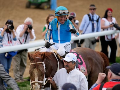 Javier Castellano, atop Mage, celebrates on his way to the winner's circle after winning the 149th running of the Kentucky Derby horse race at Churchill Downs on May 6, 2023, in Louisville, Kentucky.