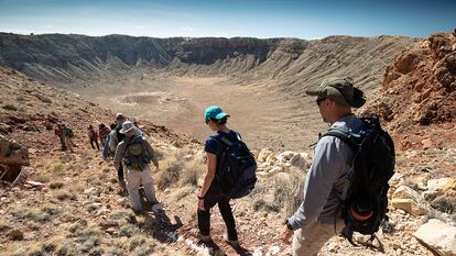 NASA astronaut candidates descend into the Barringer Crater in Arizona, created by the impact of a 50-meter (164-foot) metallic meteorite 50,000 years ago, in a 2017 image.