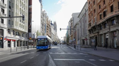 Madrid's Gran Vía, normally a hub of activity, is largely deserted due to the lockdown.