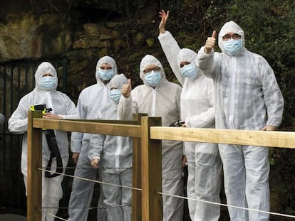 Five lucky lottery winners outside the Altamira cave.