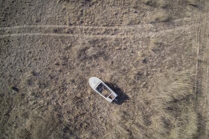 A boat stuck stranded in the Entrepeñas reservoir in Castilla–La Mancha.