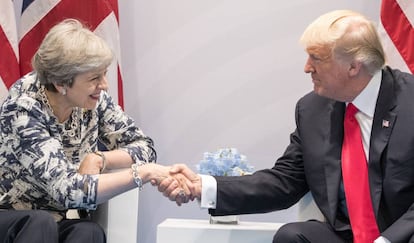 El presidente de EE UU, Donald Trump, y la primera ministra de Reino Unido, Theresa May, en el G20 en Hamburgo. Matt Cardy/Getty Images