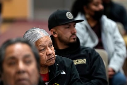 Residents of Gila River Indian Community listen during a "Road to Healing" event, Friday, Jan. 20, 2023, at the Gila Crossing Community School in Laveen, Ariz.