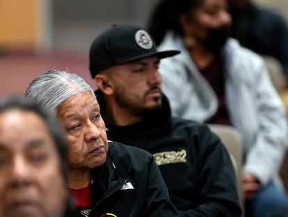 Residents of Gila River Indian Community listen during a "Road to Healing" event, Friday, Jan. 20, 2023, at the Gila Crossing Community School in Laveen, Ariz.