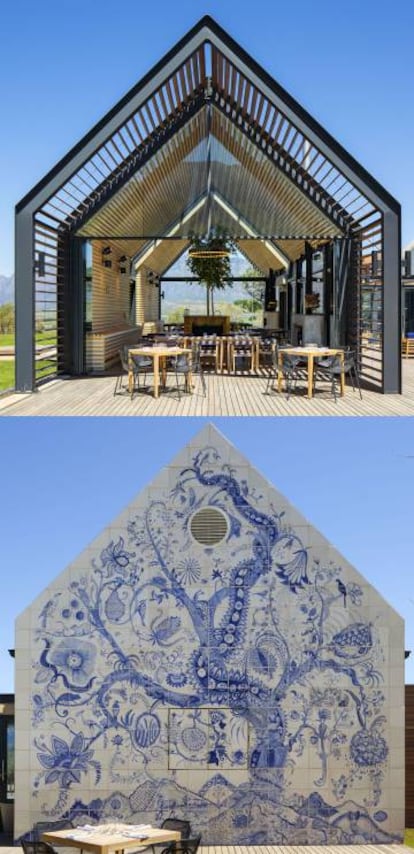 El bistró Bosjes Kombuis se construyó con los materiales típicos de la región sudafricana de Overberg, piedra, pizarra y acero, y cuenta con un árbol de la vida hecho con 366 azulejos por dos artistas locales, que representa todos los animales y las plantas de la finca. |