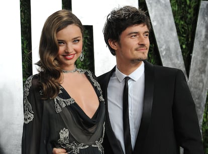Orlando Bloom junto a Miranda Kerr, cuando aún eran pareja, en la fiesta de los Oscar organizada por Vanity Fair del año 2013, en West Hollywood, California.