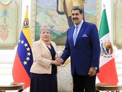 Mexican Foreign Minister Alicia Barcena shakes hands with Venezuelan President Nicolas Maduro, at the Miraflores Palace in Caracas, Venezuela, October 16, 2023.