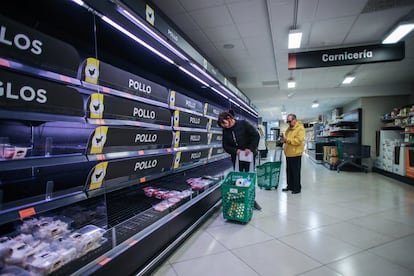 Empty meat section at a supermarket in Madrid.