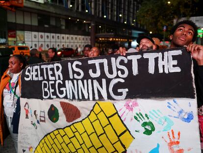 People march to Times Square, where they will sleep the night, to highlight homelessness in New York City, New York, U.S., November 16, 2023.