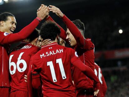 Los jugadores del Liverpool celebran un gol al Arsenal.