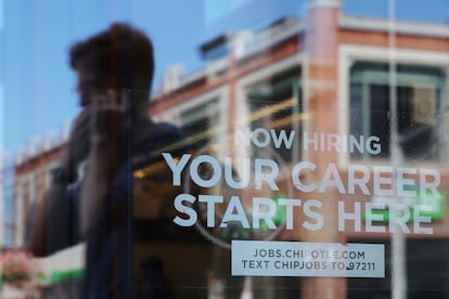 A Chipotle restaurant advertises it is hiring in Cambridge, Massachusetts, U.S