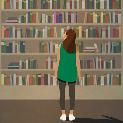 Curious woman standing at towering bookshelf