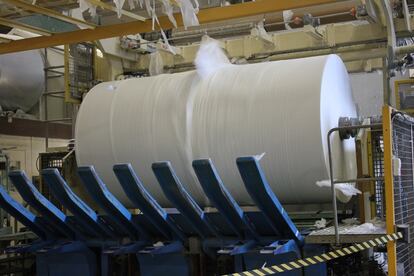 Huge roll of toilet paper spinning in Swedish factory