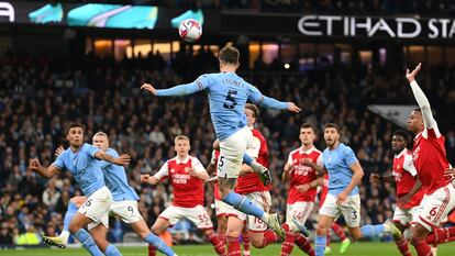 John Stones of Manchester City scores the team's second goal during the Premier League match between Manchester City and Arsenal FC at Etihad Stadium on April 26, 2023.