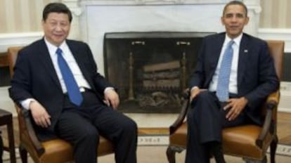 El entonces vicepresidente chino, Xi Jinping, y el estadounidense, Barack Obama, en una reunión en 2012.