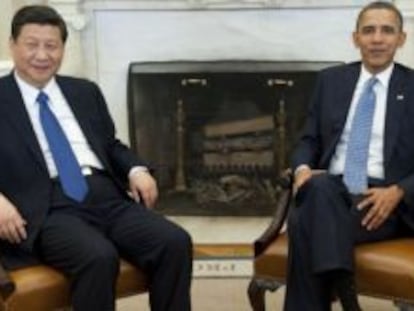 El entonces vicepresidente chino, Xi Jinping, y el estadounidense, Barack Obama, en una reunión en 2012.