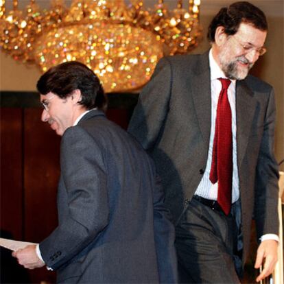 Aznar y Rajoy, durante el acto de hoy.