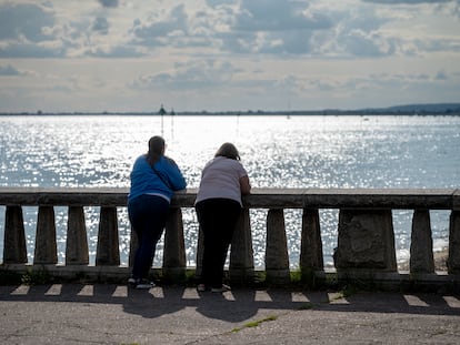 SOUTHEND, ENGLAND - JULY 25: Two women look out over the Thames estuary on July 25, 2023 in Southend on Sea, England. (Photo by John Keeble/Getty Images)