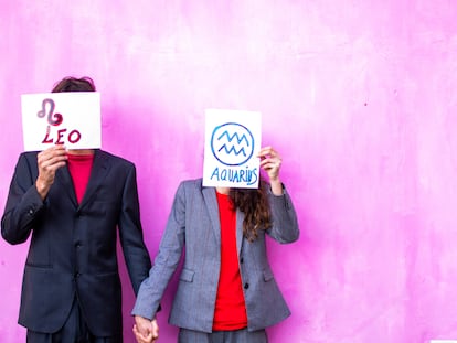 Couple with signs over their faces