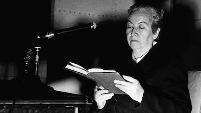 Chilean poet and Nobel winner Gabriela Mistral reads while an acetate recording is made of her reading at the Library of Congress in Washington, D.C., Dec. 14, 1950. (AP Photo/Charles Gorry)