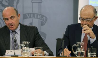 Luis de Guindos y Cristóbal Montoro