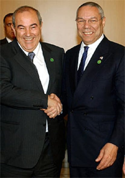 Powell y Allawi, en la Conferencia de donantes de Madrid, en 2003.