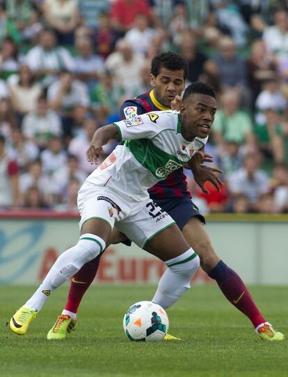 Rodrigues con Dani Alves