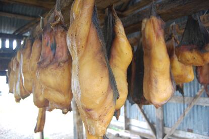 The shark meat is rinsed and hung outside to dry for four or five months