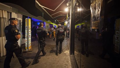 Officers patrol Port Olímpic in Barcelona.