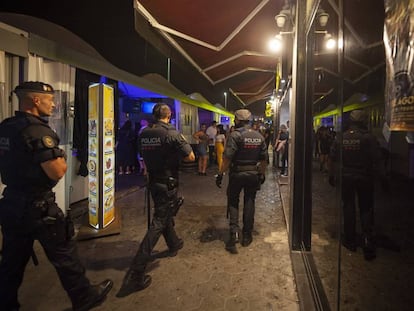 Officers patrol Port Olímpic in Barcelona.