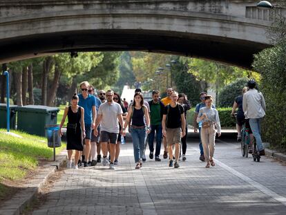 A group of people walking in Valencia, Spain.