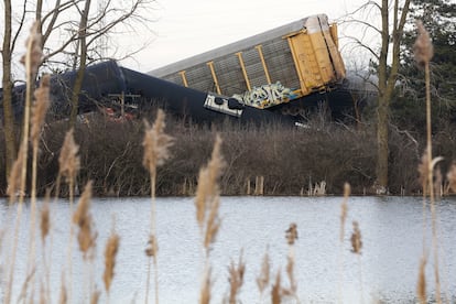 Cars of a Norfolk Southern cargo train lie toppled on one another after derailing at a train crossing with Ohio 41 in Clark County, Ohio, on Saturday, March 4, 2023.