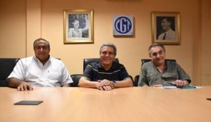 Daer (izquierda), Acuña y Schmid, integrantes del triunvirato de la CGT.