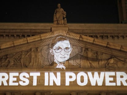 An image of Ruth Bader Ginsburg projected onto the New York State Civil Supreme Court building in Manhattan, New York City.