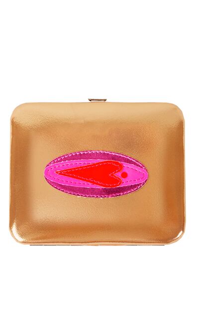 Pequelo clutch rígido dorado y rosa de Kling (12,90 euros).