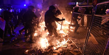 Riot police and protesters clashed in Barcelona on Tuesday night.