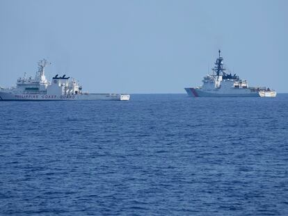 U.S. Coast Guard Cutter 'Stratton,' right, beside Philippine Coast Guard ship 'Melchora Aquino' during a trilateral Coast Guard drill off the waters in Bataan province, Philippines, Tuesday, June 6, 2023.